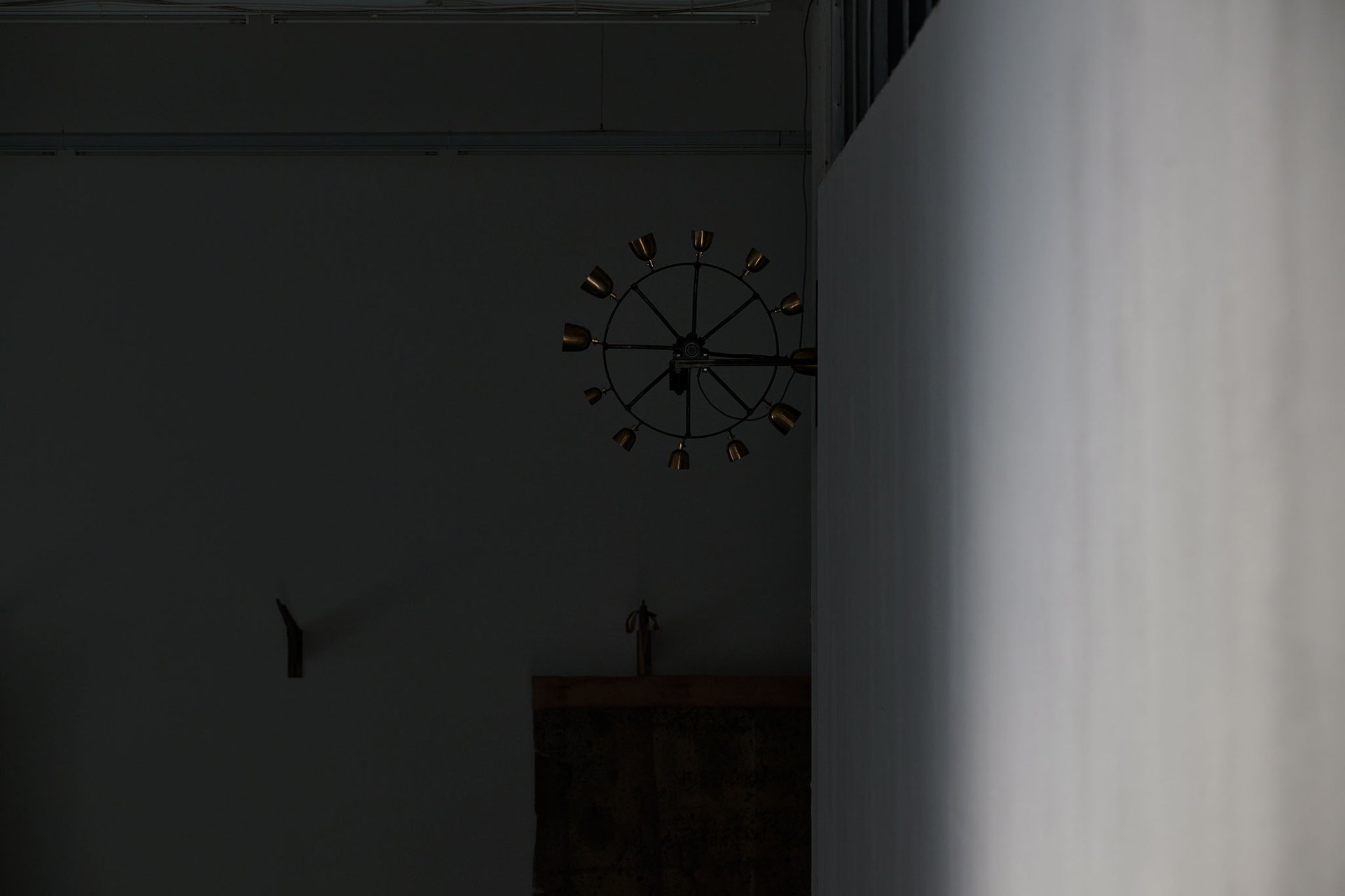 Michael Kleine, Glockenrad, 2023, beehive bells, iron wheel, motor, 83 × 80 × 29 cm