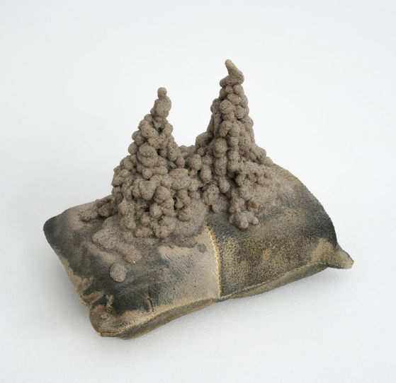 Michael Kleine, Untitled, 2019, leather, sand, 13 × 8 × 13 cm.